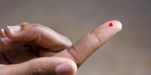 Drop Of Blood On Fingertip